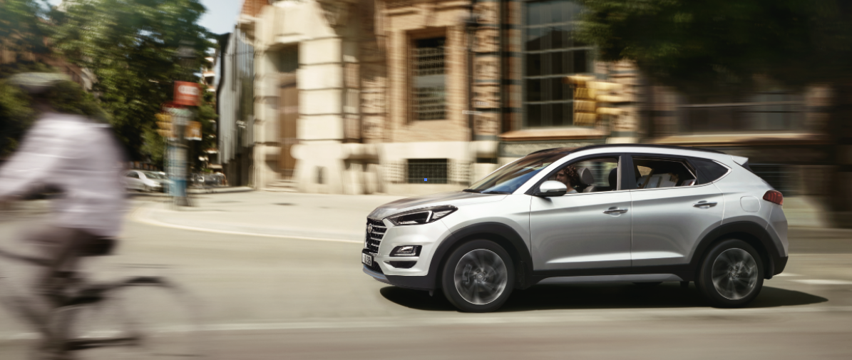 Tucson Hyundai and a person